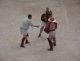 Reproduction d'un combat de gladiateurs dans l'amphithéâtre d'Arles